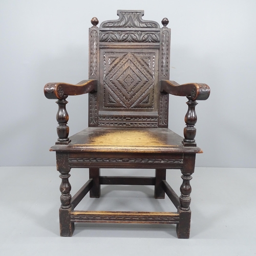 2220 - A 19th century carved oak Wainscot chair