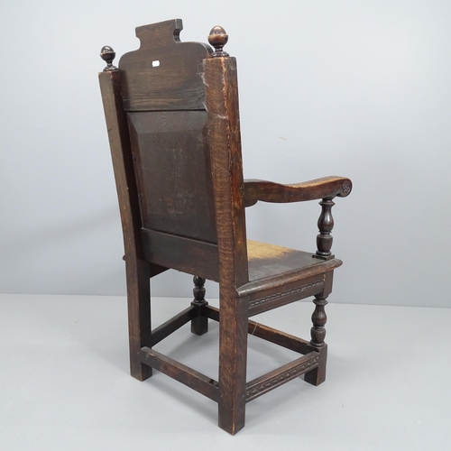 2220 - A 19th century carved oak Wainscot chair