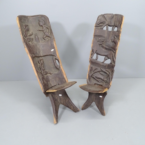 2226 - Two hand carved African two-piece chairs. Tallest 82cm.