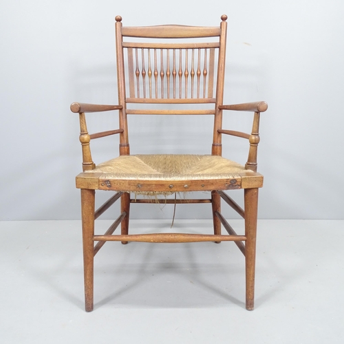 2231 - A 19th century rush-seated Sussex chair, with Arts and Crafts cushion, height 86cm