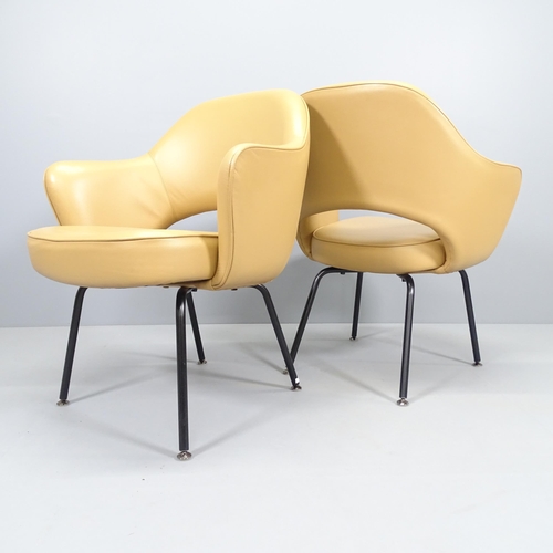 2238 - Eero Saarinen, a pair of Knoll Executive armchairs in tan leather with impressed Knoll Studio and Sa... 