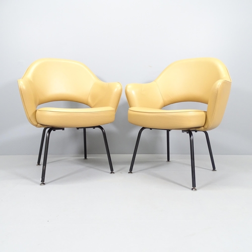 2239 - Eero Saarinen, a pair of Knoll Executive armchairs in tan leather with impressed Knoll Studio and Sa... 