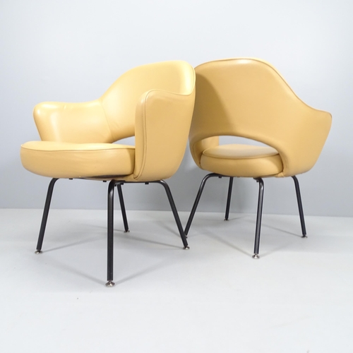 2239 - Eero Saarinen, a pair of Knoll Executive armchairs in tan leather with impressed Knoll Studio and Sa... 