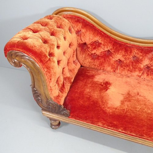 2240 - A Victorian mahogany and upholstered chaise longue, with carved acanthus leaf decoration and raised ... 