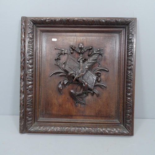 2252 - A carved oak armorial wall plaque. 62x65x6cm