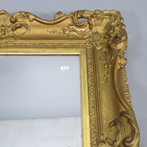 2258 - An antique giltwood and gesso framed wall mirror. 87x77cm