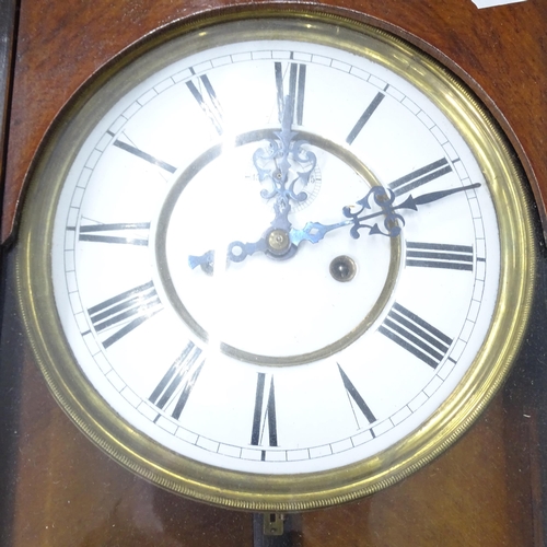 2259 - A carved walnut cased Vienna regulator wall clock.