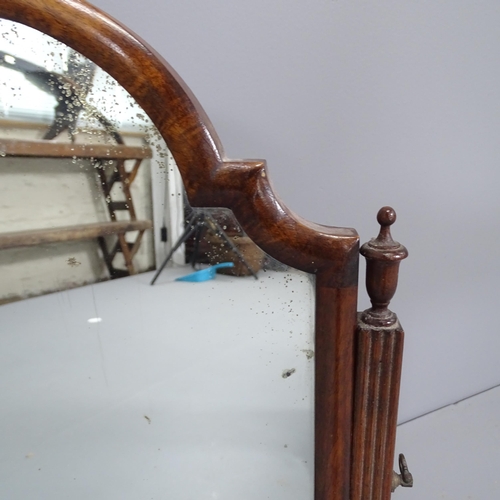 2262 - A Victorian walnut swing toilet mirror. 44x63cm