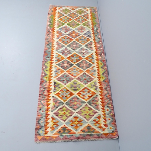 2266 - A Chobi Kilim runner, 236x80cm.