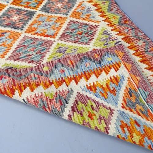 2266 - A Chobi Kilim runner, 236x80cm.