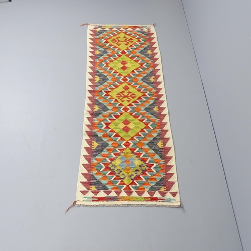 2269 - A Chobi Kilim runner. 198x62cm