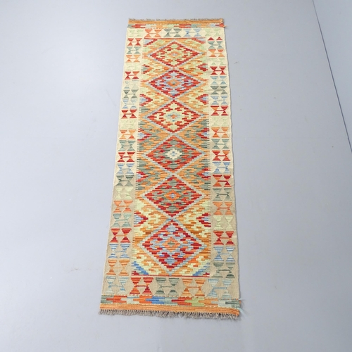 2282 - A Chobi Kilim runner. 192x63cm.