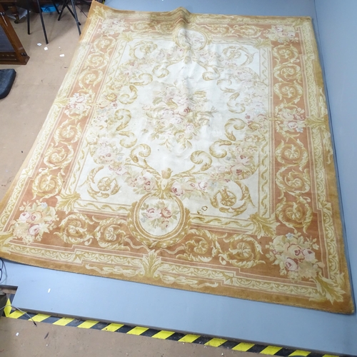 2286 - A cream-ground Aubesson carpet. 303x250cm