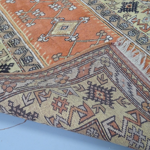 2287 - A cream-ground Caucasian rug. 190x120cm.