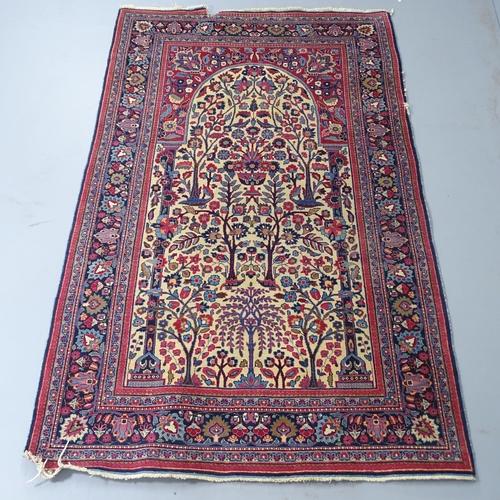 2311 - A blue and red-ground Persian prayer rug. 216x130cm