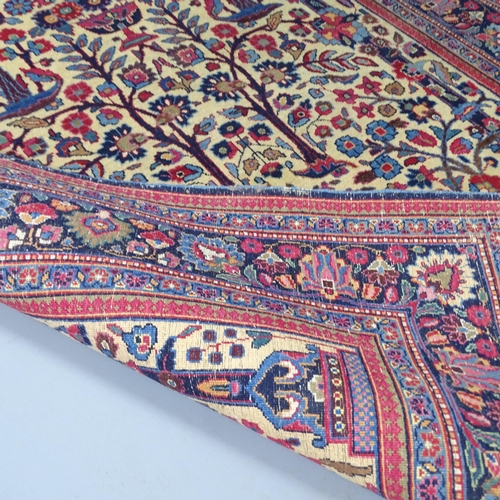 2311 - A blue and red-ground Persian prayer rug. 216x130cm