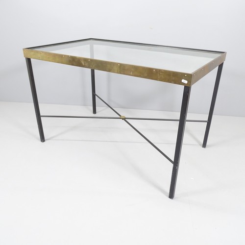 2005 - A mid-century Italian iron and brass table with glass top and cross stretcher, 116 x 70cm, height 74... 