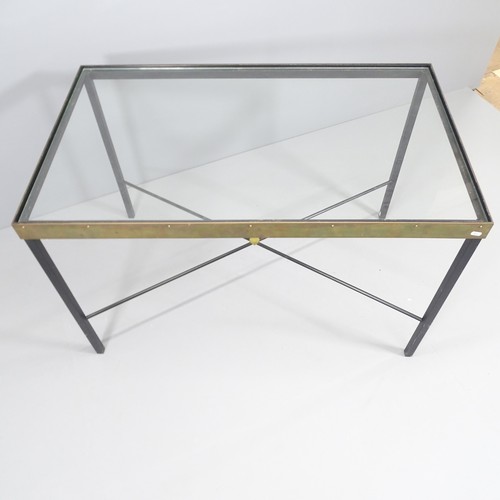 2005 - A mid-century Italian iron and brass table with glass top and cross stretcher, 116 x 70cm, height 74... 