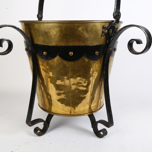 535 - An Arts and Crafts brass and wrought-iron bucket, H55cm