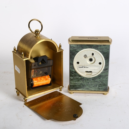 597 - A Junghans electronic clock, and a Schindler clock, H14cm