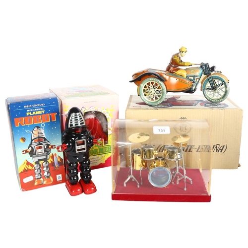 751A - A quantity of Vintage and modern tinplate wind-up clockwork toys, mostly in original boxes, includin... 