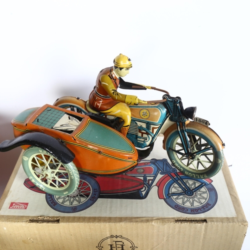 751A - A quantity of Vintage and modern tinplate wind-up clockwork toys, mostly in original boxes, includin... 