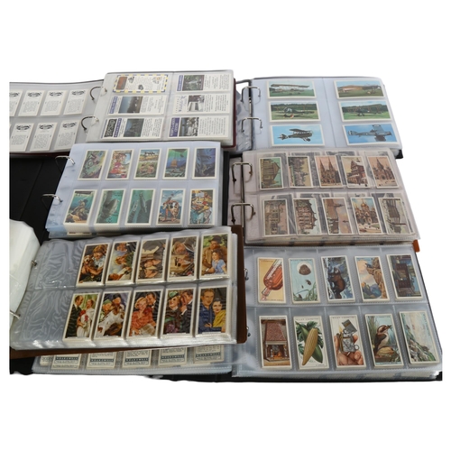 754 - A large quantity of complete sets of cigarette and trade cards, in display cases, including such set... 