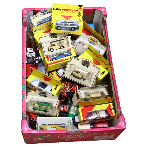 775 - A large quantity of diecast vehicles, both boxed and unboxed, including such brands as Corgi, Dinky,... 