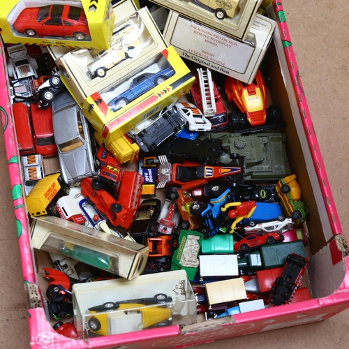 775 - A large quantity of diecast vehicles, both boxed and unboxed, including such brands as Corgi, Dinky,... 