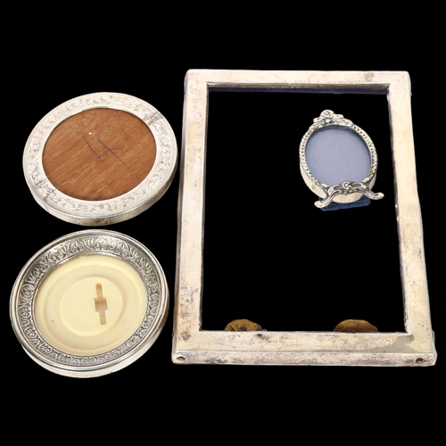 1013 - 4 various silver-fronted photo frames, including a small circular frame and an oval frame