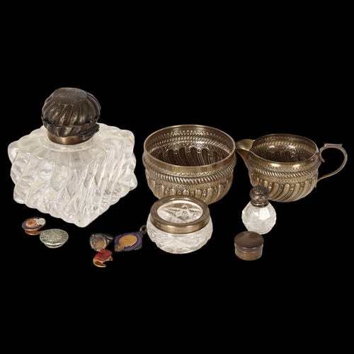 1018 - A large cut-glass inkwell with silver lid (A/F), a silver-mounted salt, a silver fob, and a silver s... 