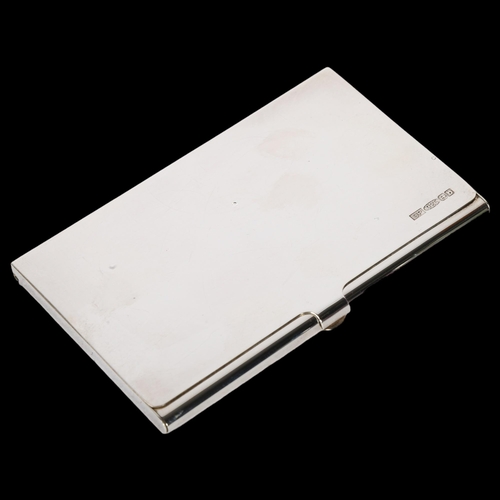 1030 - A Queen Elizabeth II silver card case in new condition, from the Hallmark Collection, in original fi... 