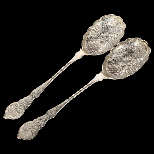 1035 - A pair of late Victorian silver tablespoons, with allover relief embossed decoration, hallmarks for ... 