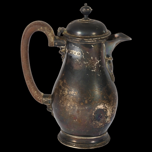 1037 - A George V silver hot water jug, hallmarks for London 1934, H17.5cm, 8.4oz gross