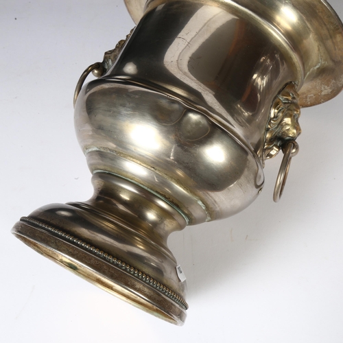 905 - A silver plated Champagne bucket, with lion mask ring handles, H25cm, and a moulded glass and silver... 