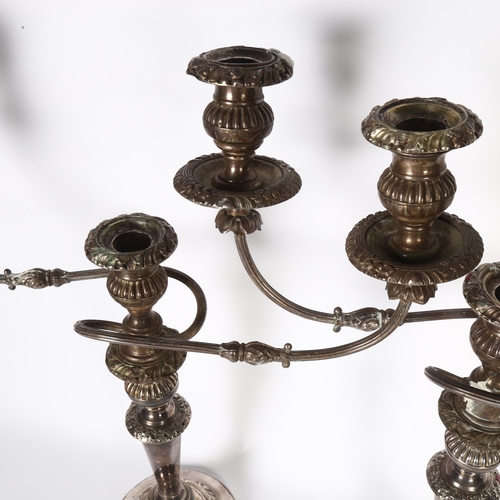 908 - A large pair of silver plate on copper 2-branch candelabras (1 sconce missing), H49cm