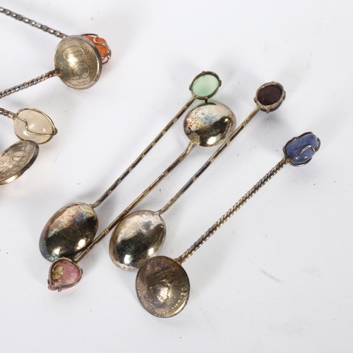 914 - A cased set of 6 unmarked silver coffee spoons, with stone set handles, a cased set of spoons with c... 