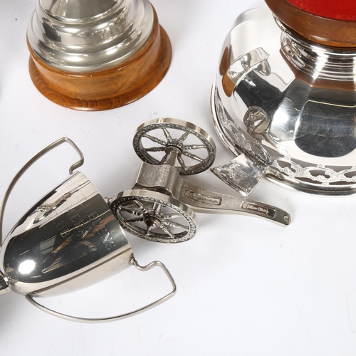 919 - 3 silver plated presentation trophies, tallest 32cm, a fruit bowl on stand, and a table cannon paper... 