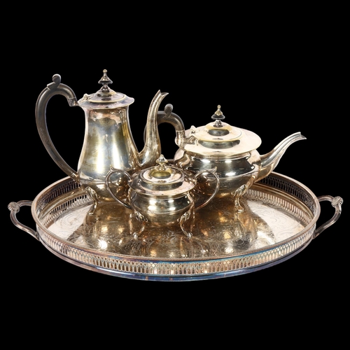 920 - A silver plated 3-piece tea set, together with an oval galleried 2-handled serving tray