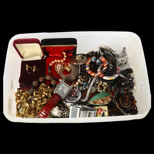 938 - A box of various costume jewellery, including a glass bead necklace, bracelets, various brooches, wr... 