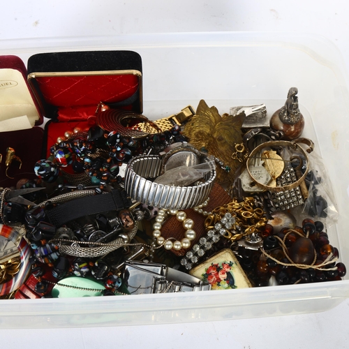 938 - A box of various costume jewellery, including a glass bead necklace, bracelets, various brooches, wr... 