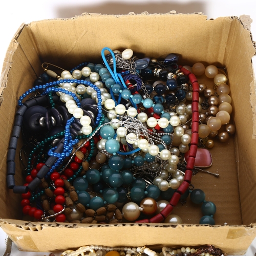 939 - 2 boxes of costume necklaces etc, including tigers eye, amber etc