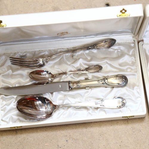 951 - 2 cased French presentation sets of cutlery, each comprising knife fork teaspoon and tablespoon