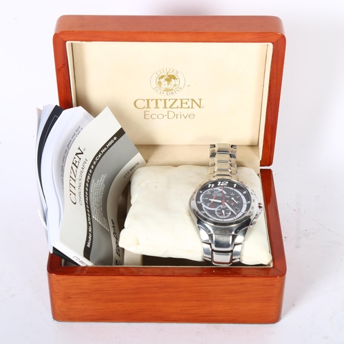 960 - CITIZEN - a  gent's Eco Drive stainless steel-cased tachymeter wristwatch, with instruction booklet,... 