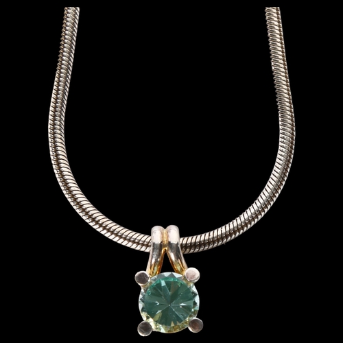 968 - SCROUOLES A/S - a Danish sterling and green stone set pendant and chain