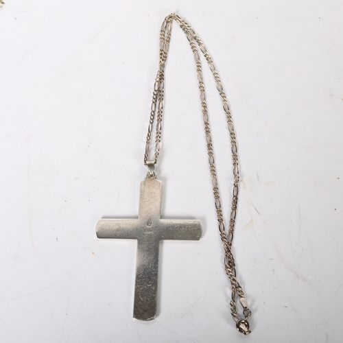 977 - A large embossed silver crucifix and chain