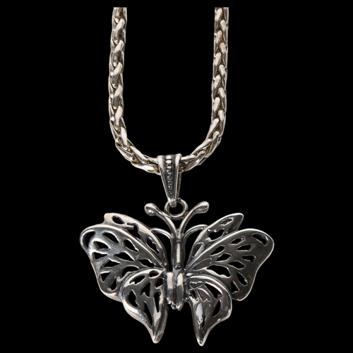 980 - A sterling silver butterfly design pendant and chain