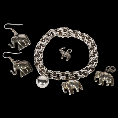 985 - HUGO GRUN, DANISH - a silver bracelet with elephant charms, a pair of similar earrings and fob