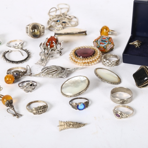 989 - A collection of silver stone set dress rings, micro-mosaic brooch, and other costume jewellery