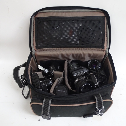 259 - A quantity of Vintage cameras and equipment, including a Kodak Retina IA, a Polaroid Supercolour 635... 